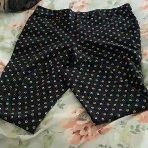 Faded Glory black & white stretchy pans w flowers. Women’s size (14) 27”…